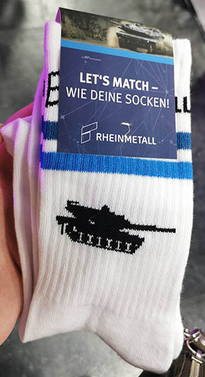 A pair of promotional Rheinmetall socks given away at gamescom 2026.