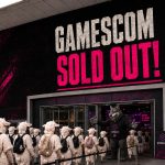 Gamescom entrance in Cologne with the slogan "Gamescom Sold Out", showing a line of sheep being let inside by a wolf.